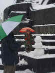 Building a snowman in Staromestske namesti