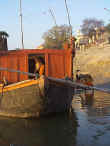 Holy man permanently moored aside the banks of the Ganga