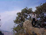 Laura perched atop the mountian side