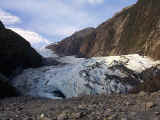 The massive Franz Josef Glacier creeping down into the valley