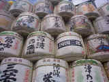 Containers of sake stacked to the sky